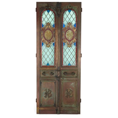 Large pair of bronze doors with stained glass inset panels