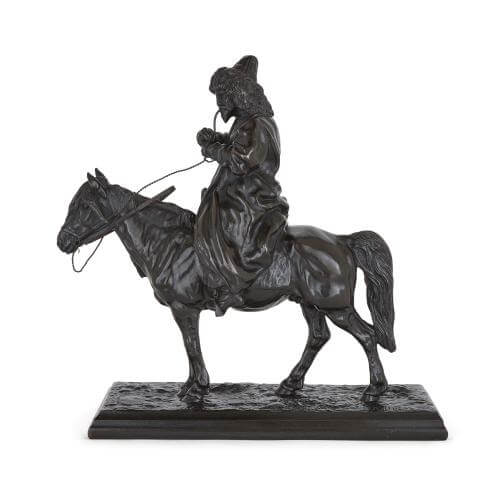 Antique Russian cast iron figure of a Cossack on horseback 