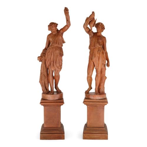 Pair of terracotta sculptures emblematic of Hunting and Fishing