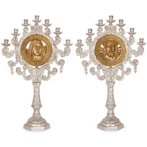 Pair of antique silvered and gilt bronze religious candelabra