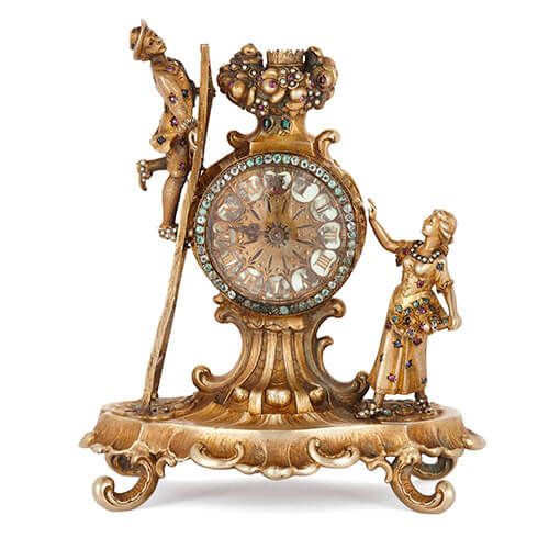 Antique Viennese silver gilt and precious stone table clock