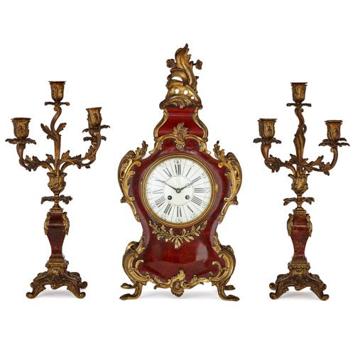 Antique French ormolu and tortoiseshell three piece clock set