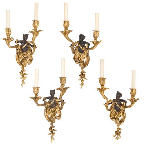 Four Louis XV style gilt and patinated bronze wall lights