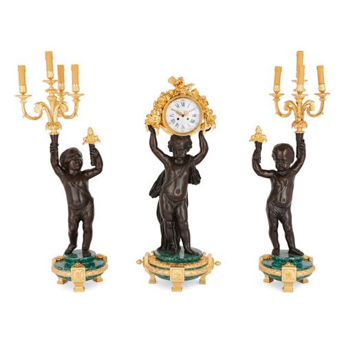 Large ormolu, malachite and patinated bronze clock set