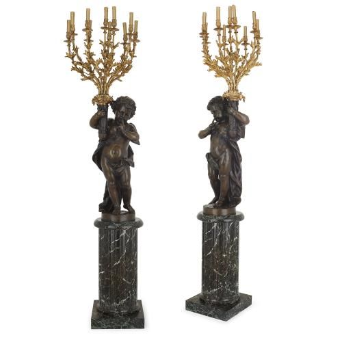 Pair of large French gilt and patinated bronze antique torcheres