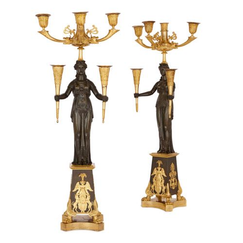 Two Empire period gilt and patinated bronze candelabra