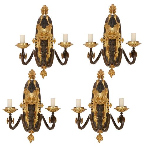 Set of four antique gilt and patinated bronze wall lights