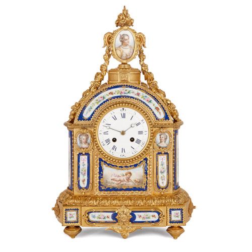 Antique Sèvres style ormolu mantel clock with porcelain plaques