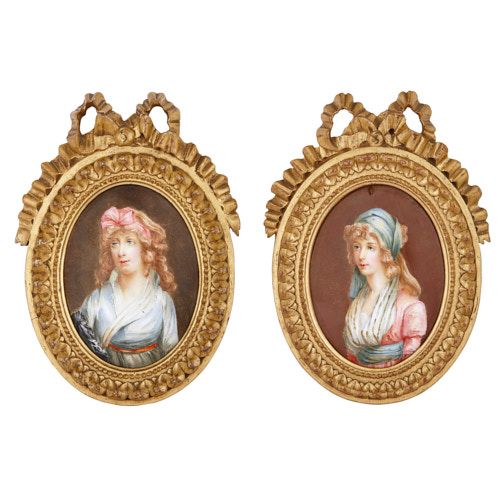 Pair of antique Limoges enamel portraits in giltwood frames 