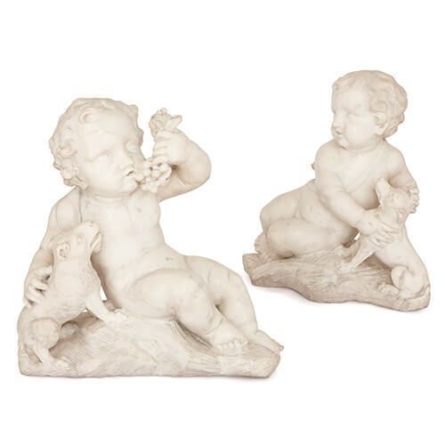Pair of 18th Century Italian white marble putti sculptures