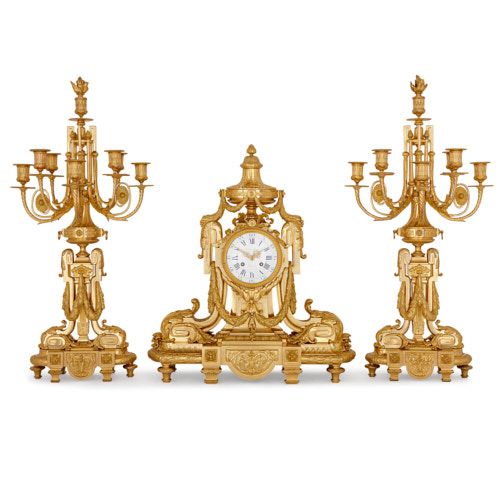 Antique Louis XV style ormolu clock set by Royer