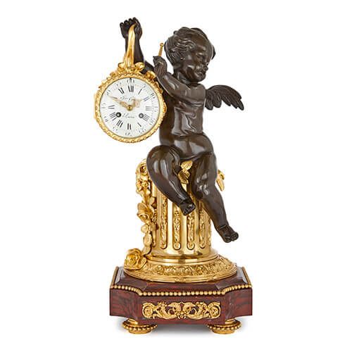 Antique gilt, patinated bronze and marble mantel clock