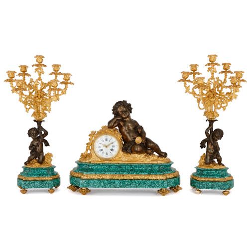Louis XVI style gilt and patinated bronze malachite clock set