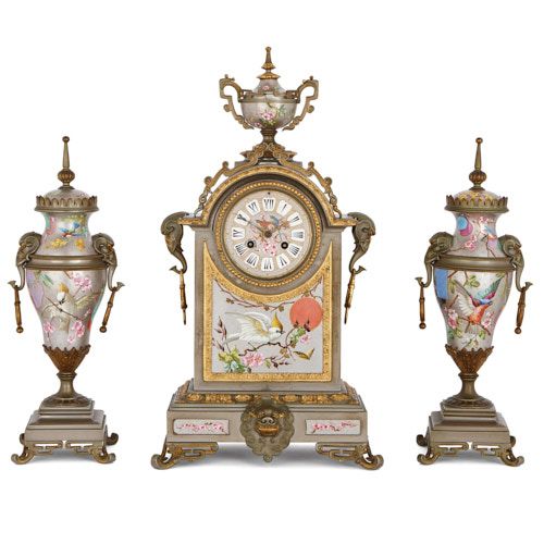 Antique porcelain, silvered and parcel gilt brass clock set