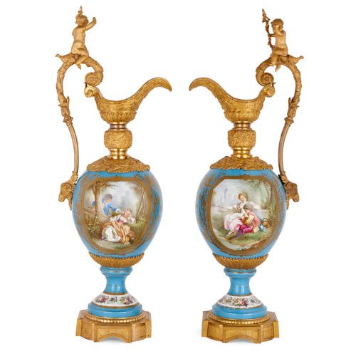 Pair of very large Sèvres style porcelain and ormolu ewers