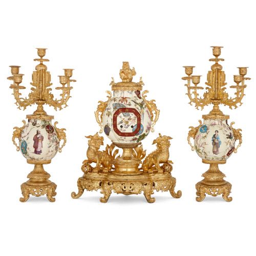 Chinoiserie style ormolu and faience three-piece clock set