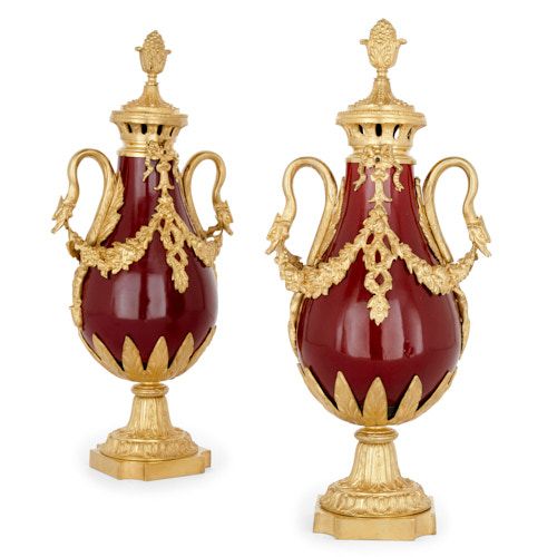 Pair of Empire style ormolu and red tôle vases
