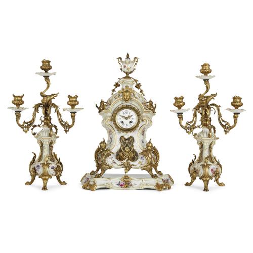 Ormolu mounted porcelain three-piece clock set by KPM