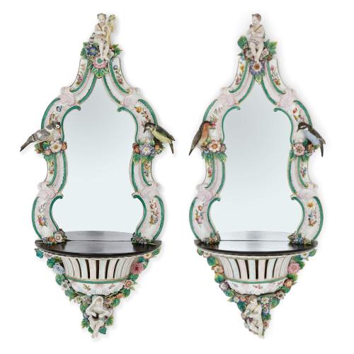Large pair of Dresden porcelain and ebonised wood mirrors