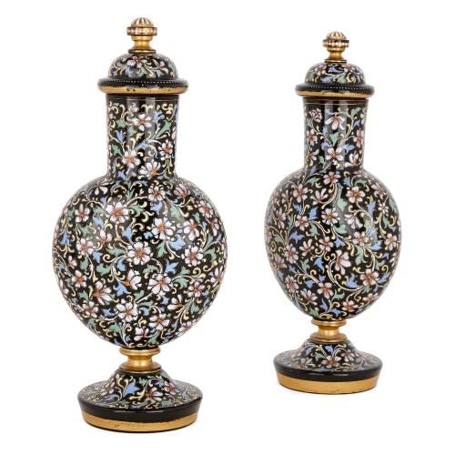 Pair of Bohemian florally decorated enamelled black glass vases