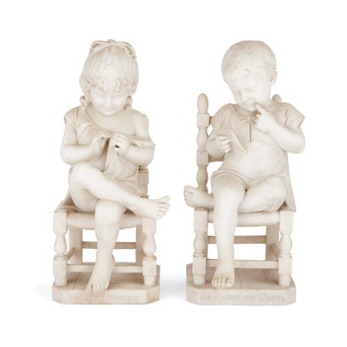 Rare pair of seated-child marble sculptures by Cesare Lapini