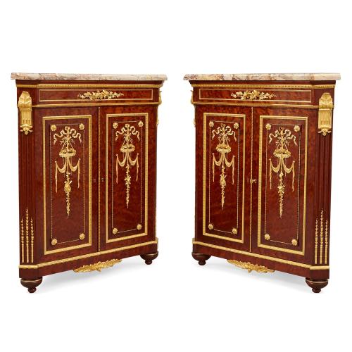 Pair of mahogany and ormolu corner cabinets by Grohé Frères