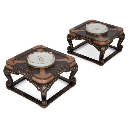Pair of Chinese lacquered low tables with porcelain hot water plates
