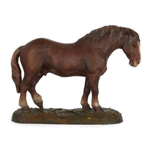 Antique terracotta sculpture of a horse