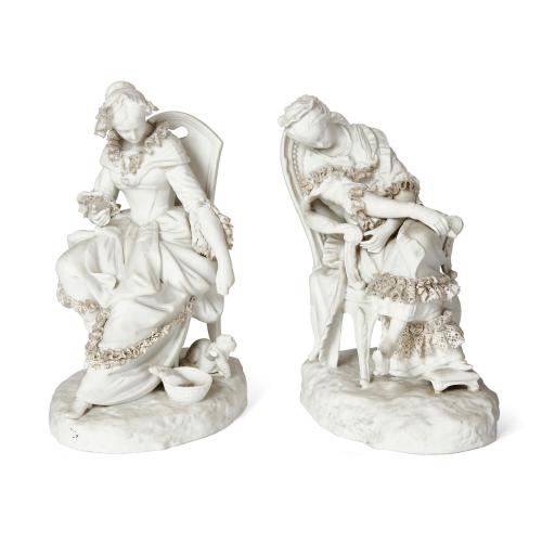 Pair of Sèvres style bisque porcelain seated female figures