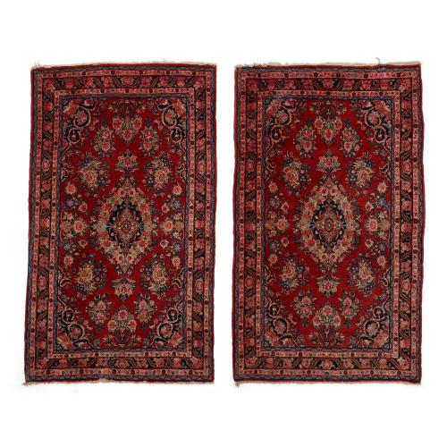 Pair of Persian Kashan floral wool rugs